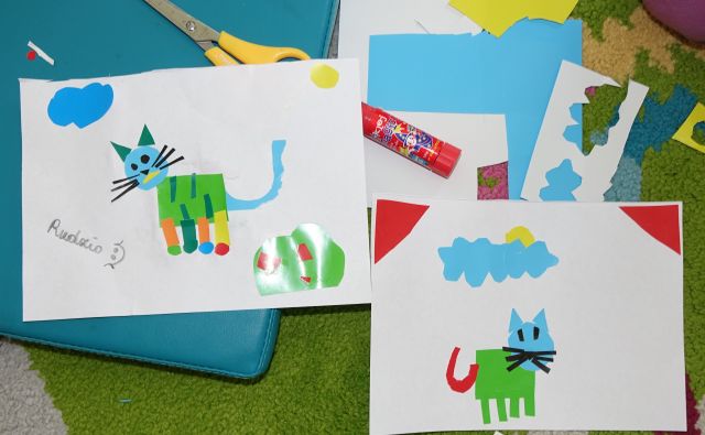 koty wycięte z wycinanek naklejone na białą kartkę